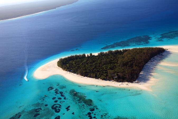 Tanzania zanzibar andBeyond mnemba island overhead family safari beach