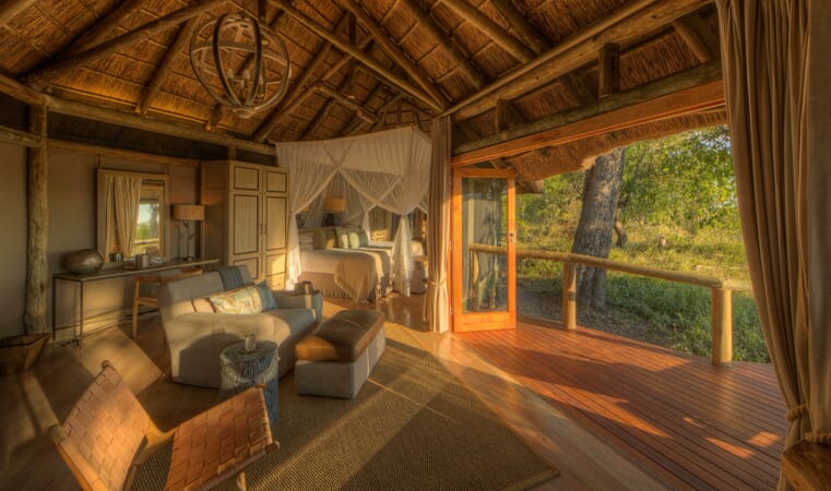 Camp-Moremi-Guest-Room-Interior-scaled.jpg?w=761&h=450&scale