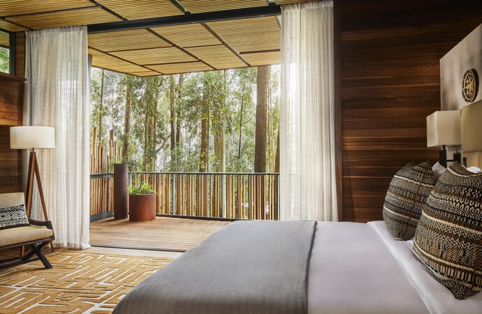 One&Only Gorilla’s Nest Volcanoes National Park Luxury Family Safaris Rwanda Coral Tree Travel